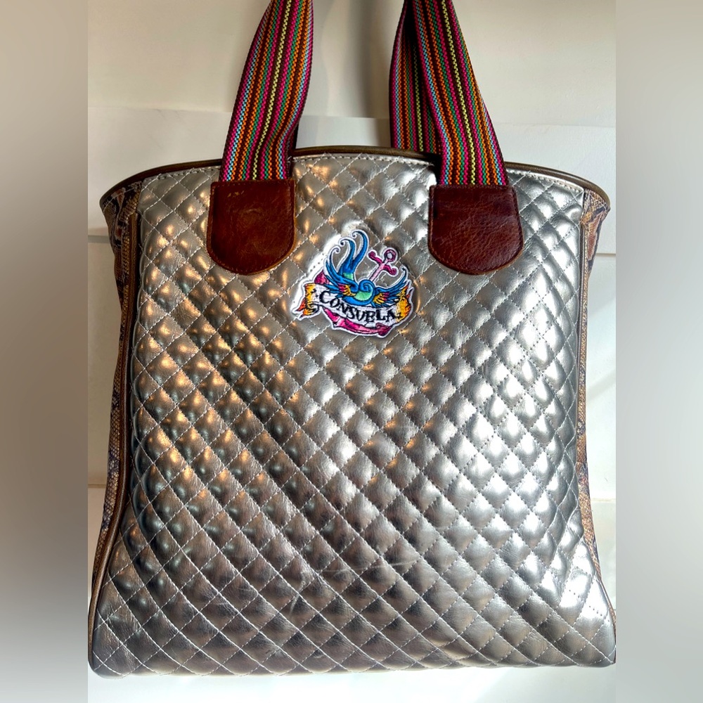 New condition Consuela Tote in silver and snake print